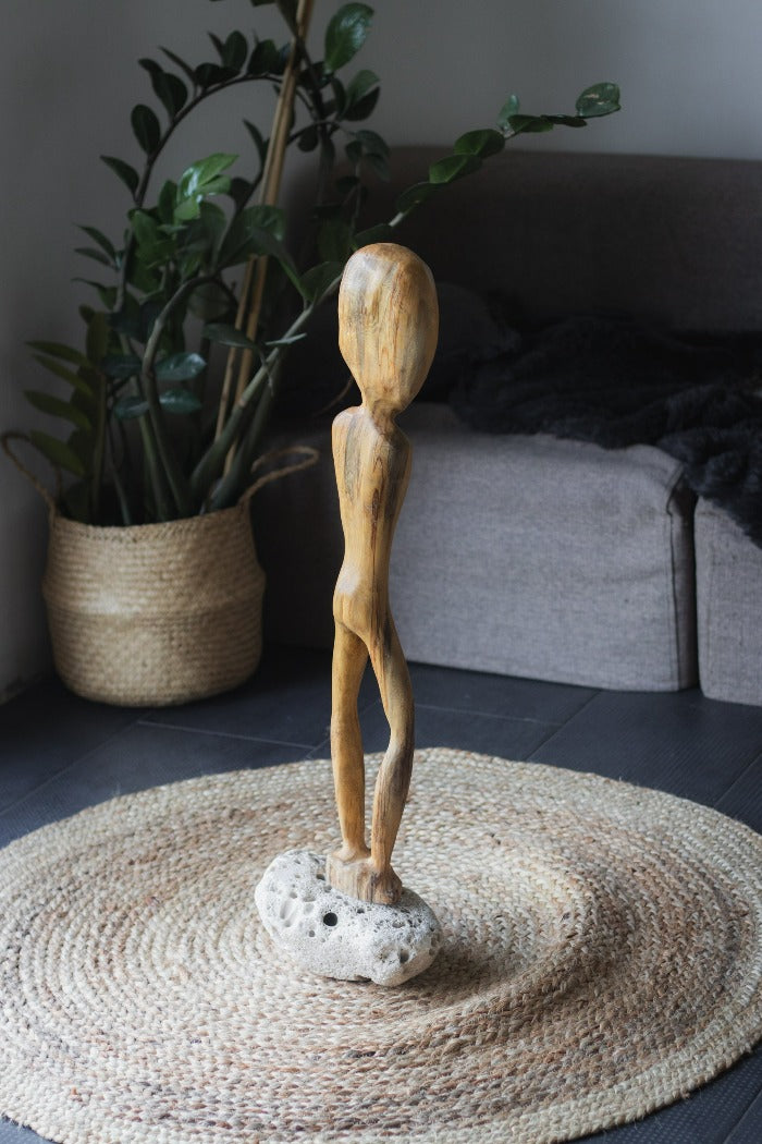 Frank Wooden Figurine on Stone